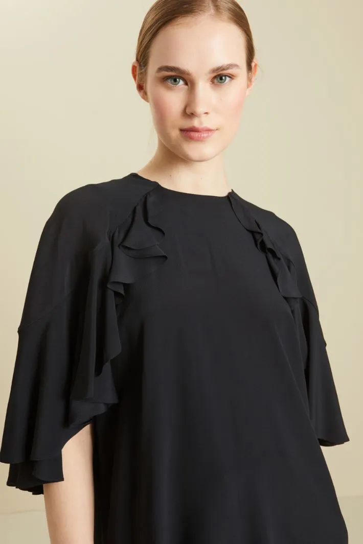Blusa con volant