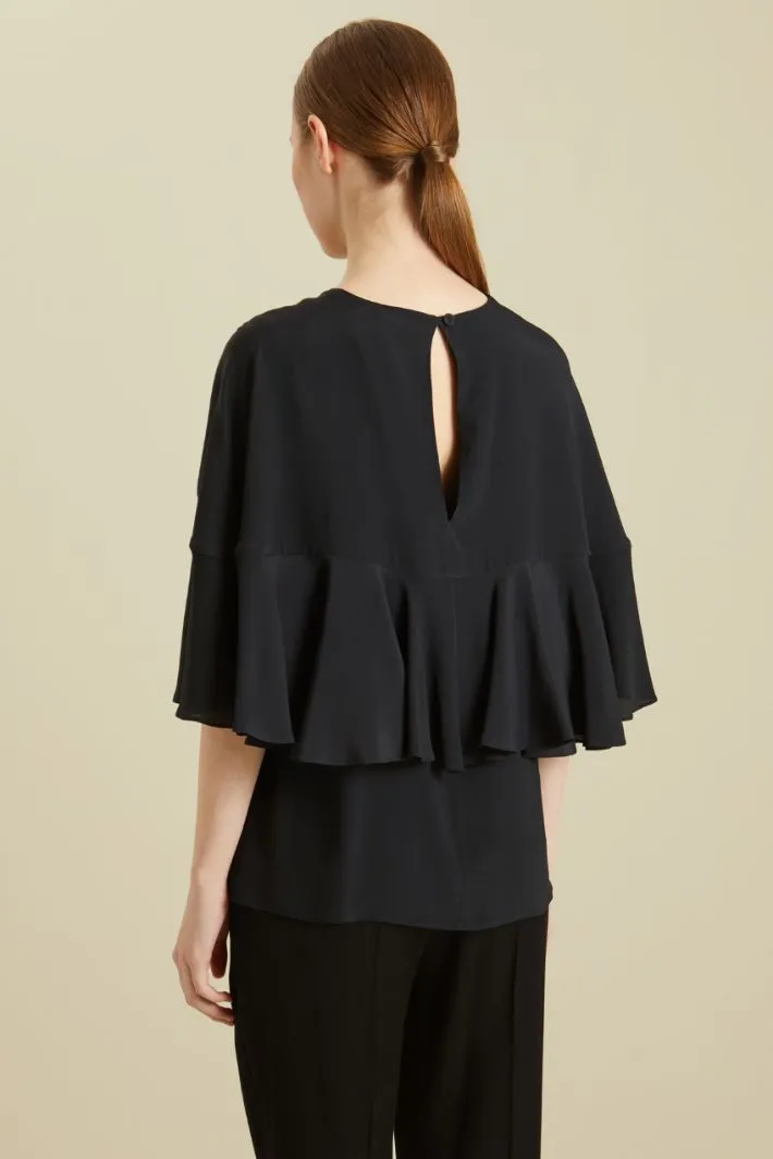 Blusa con volant
