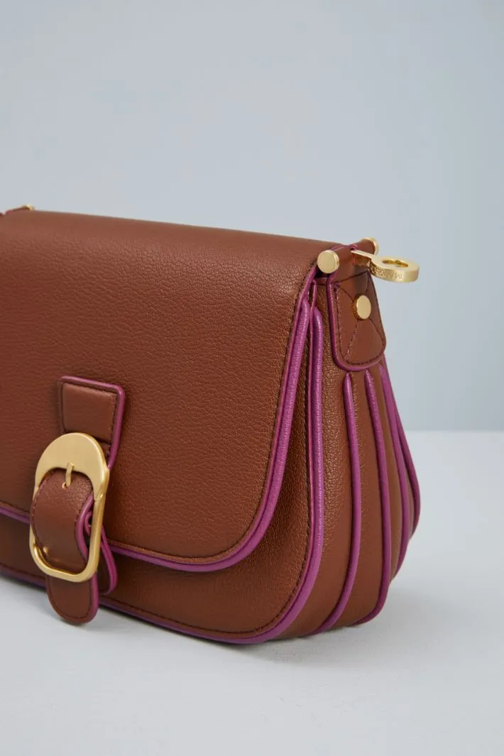 Borsa con piping a contrasto