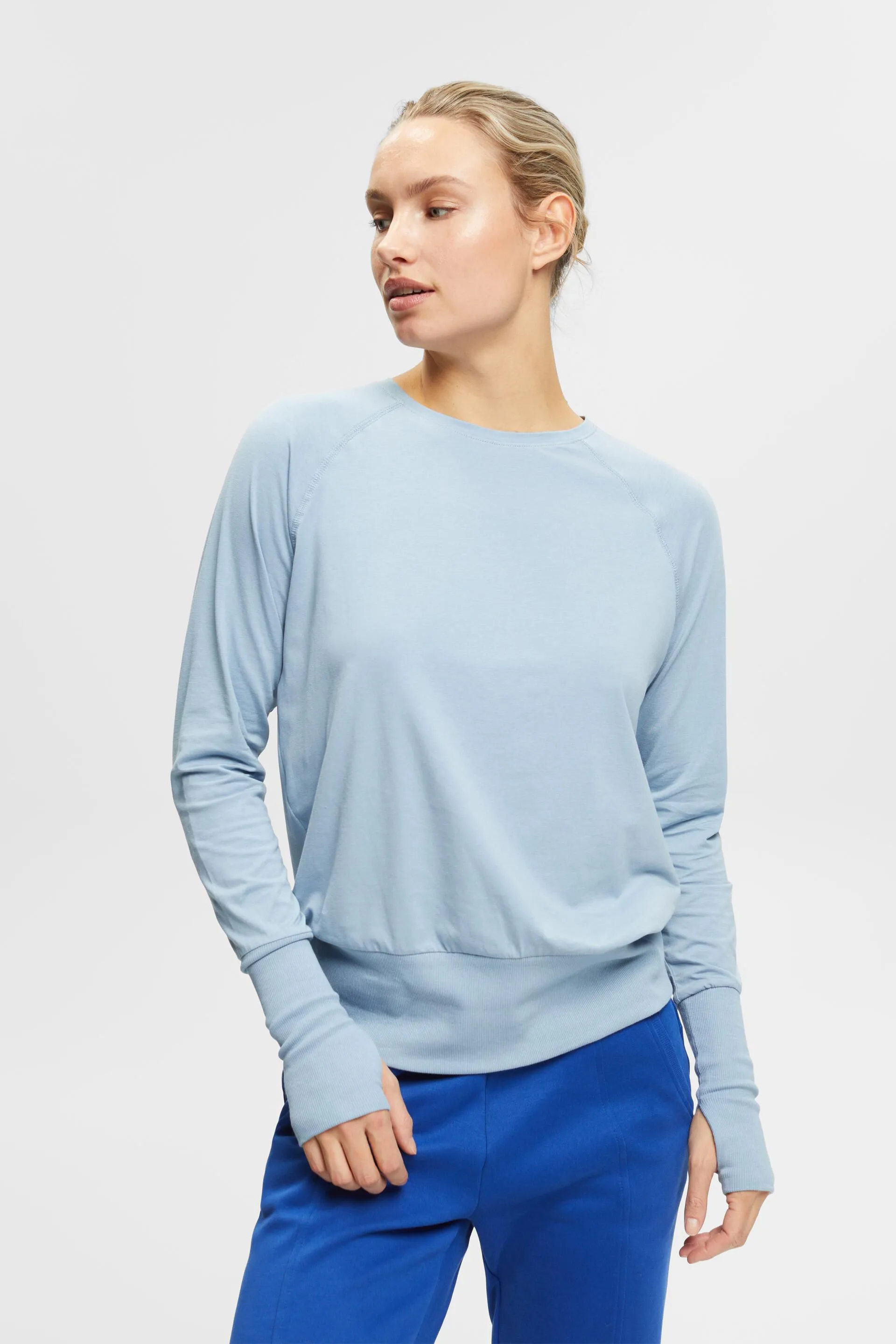 Maglia a maniche lunghe con fori per i pollici