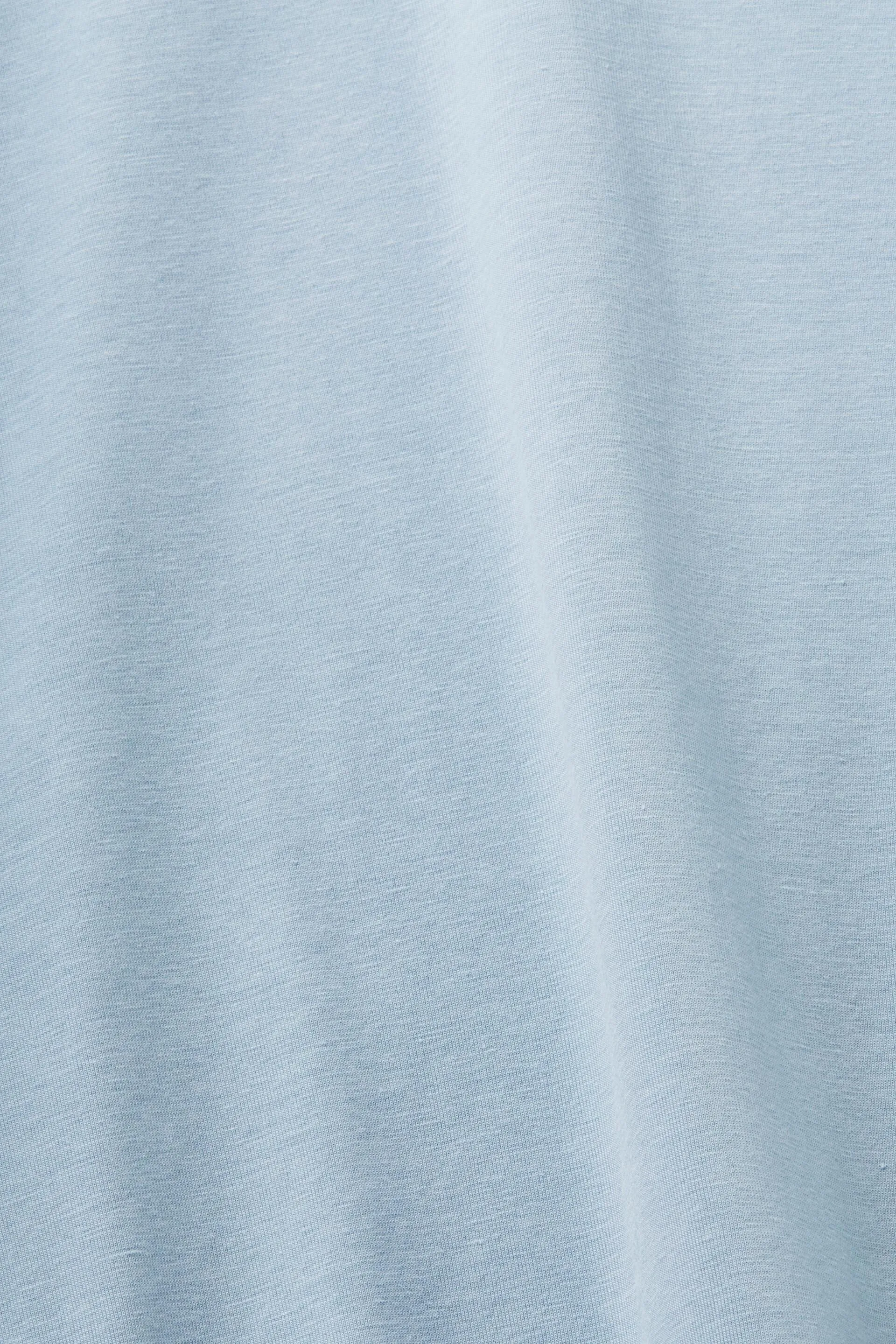 Maglia a maniche lunghe con fori per i pollici