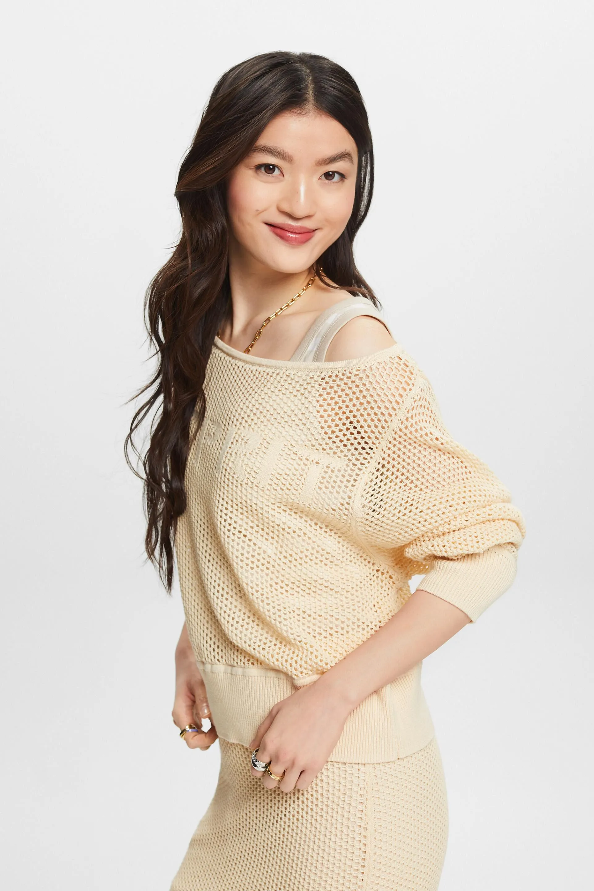 Pullover in mesh con scollo a barchetta e logo
