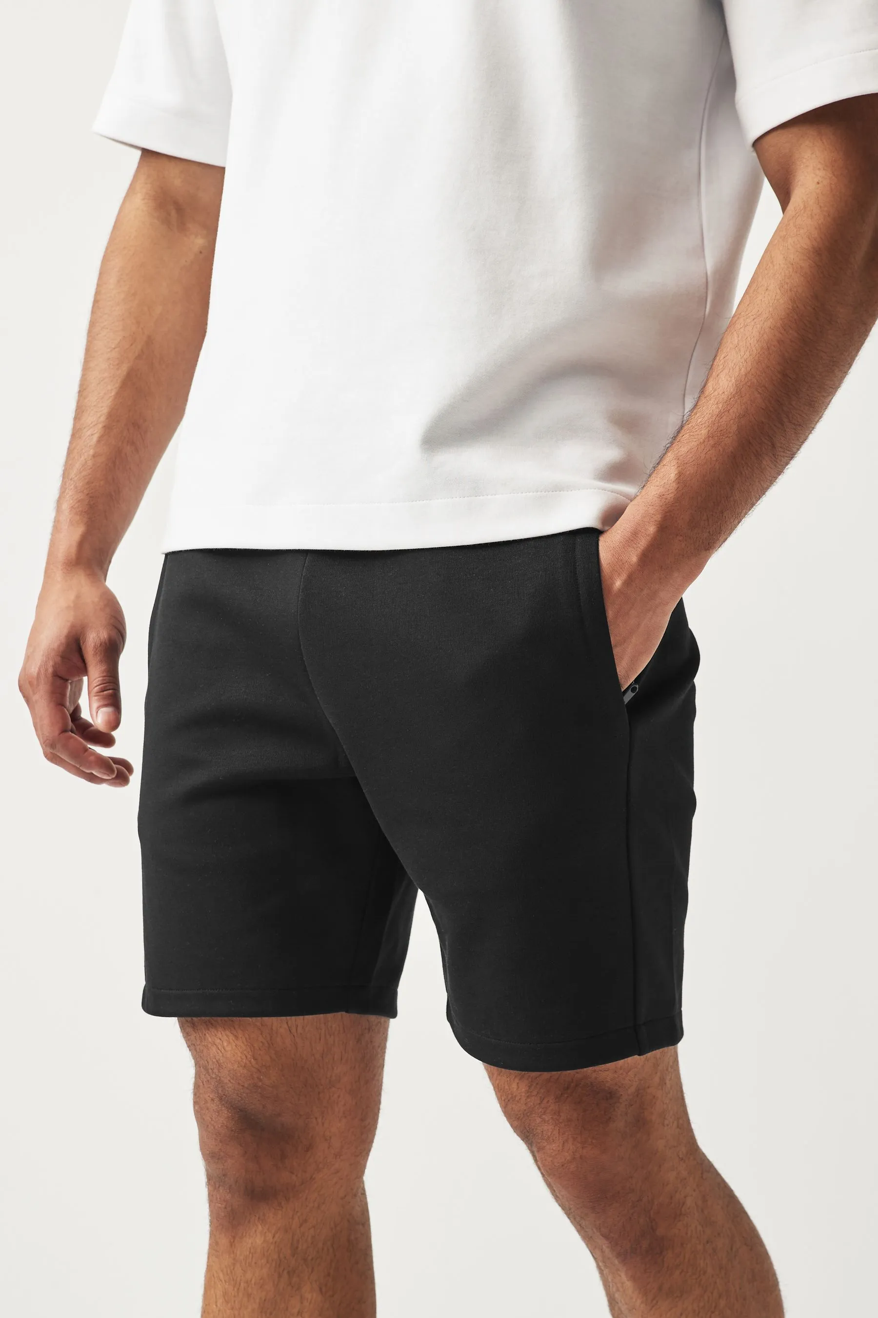 Shorts in jersey con tasche con zip