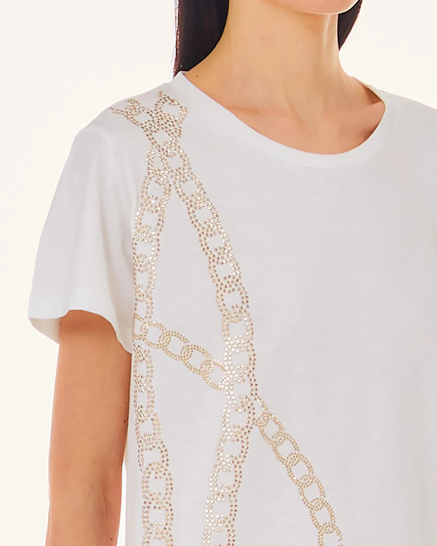 T-shirt bianca in cotone con motivo a catena in strass dorati lungo il fianco